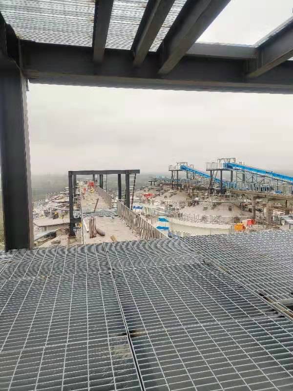 Grain storage logistics park with anti-slip steel grating walkways