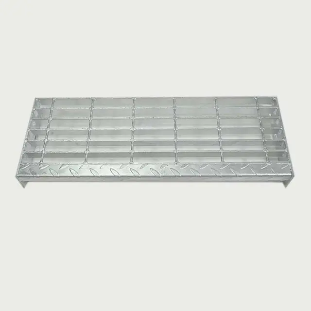Industrial steel stair landing with grating infill