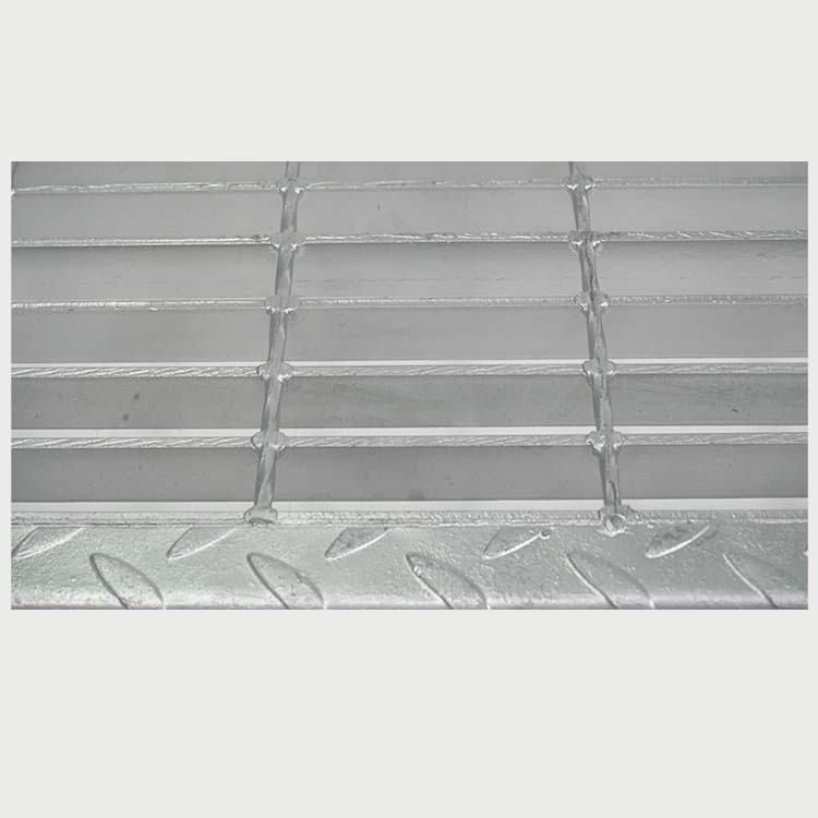 Bolted or demountable stair tread construction detail